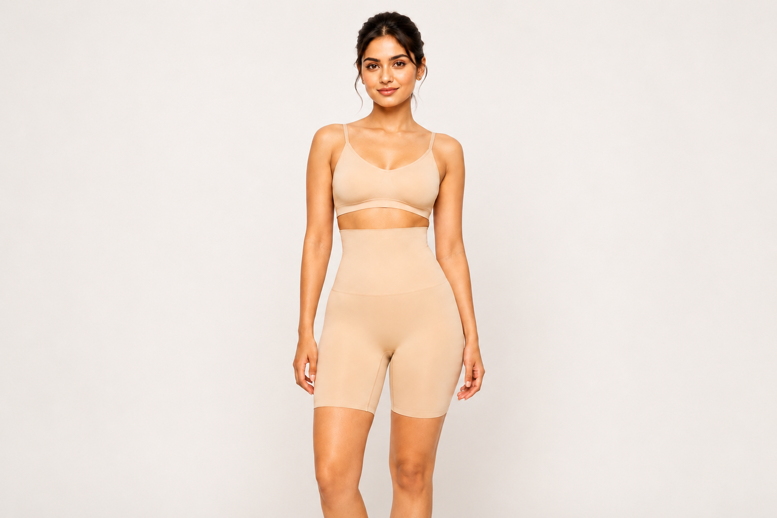 Woman wearing Curvy Peach Shaper under a fitted athleisure set